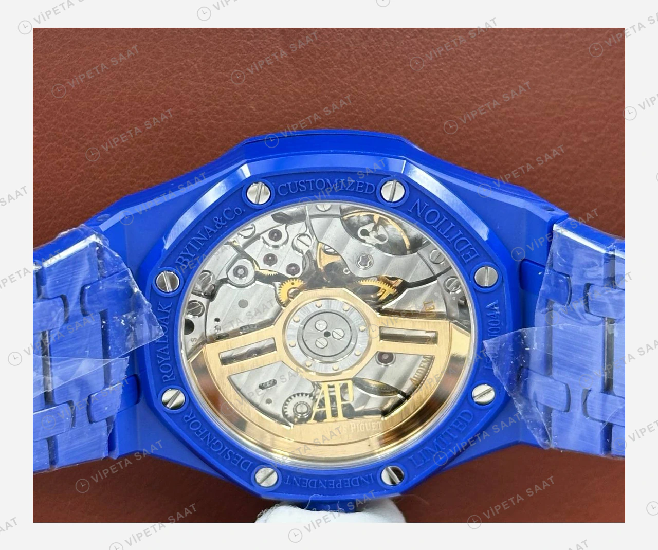 Audemars Piguet Royal Oak Mavi Seramik Kadran Kauçuk Super Clone ETA Eta Saat yan görünüm