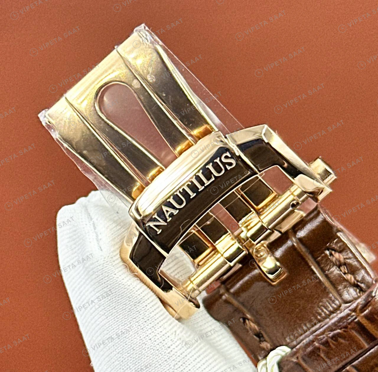 Patek Philippe Nautilus 5712 40 mm Rose Gold Mavi Ay Evreli Deri Super Clone ETA Eta Saat detay 5