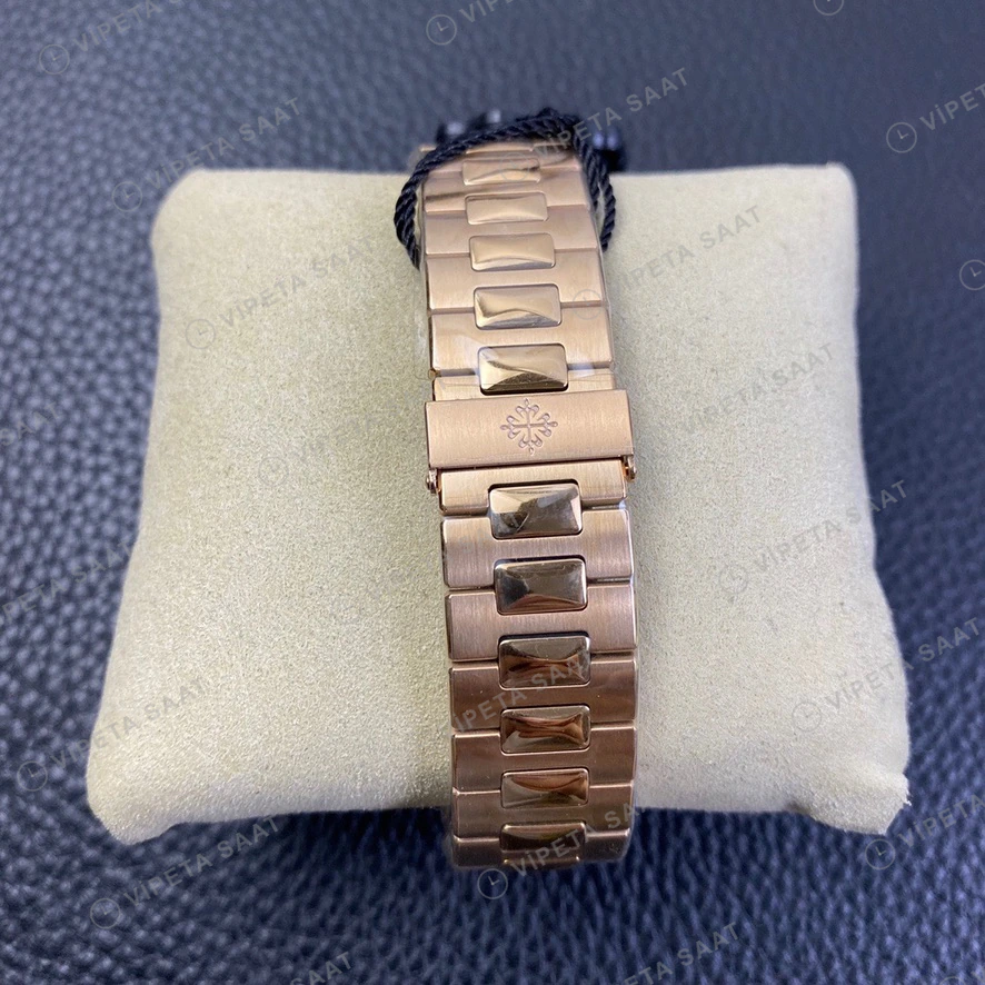 Patek Philippe Nautilus Beyaz Kadran Rose Kasa Baget Bezel Celik Kordon Super Clone Eta Eta Saat detay 4