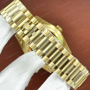 Rolex Datejust 126233 41 mm fluted Yeşil Kadranlı Sarı Altın Super Clone Eta Saat karşıdan görünüm