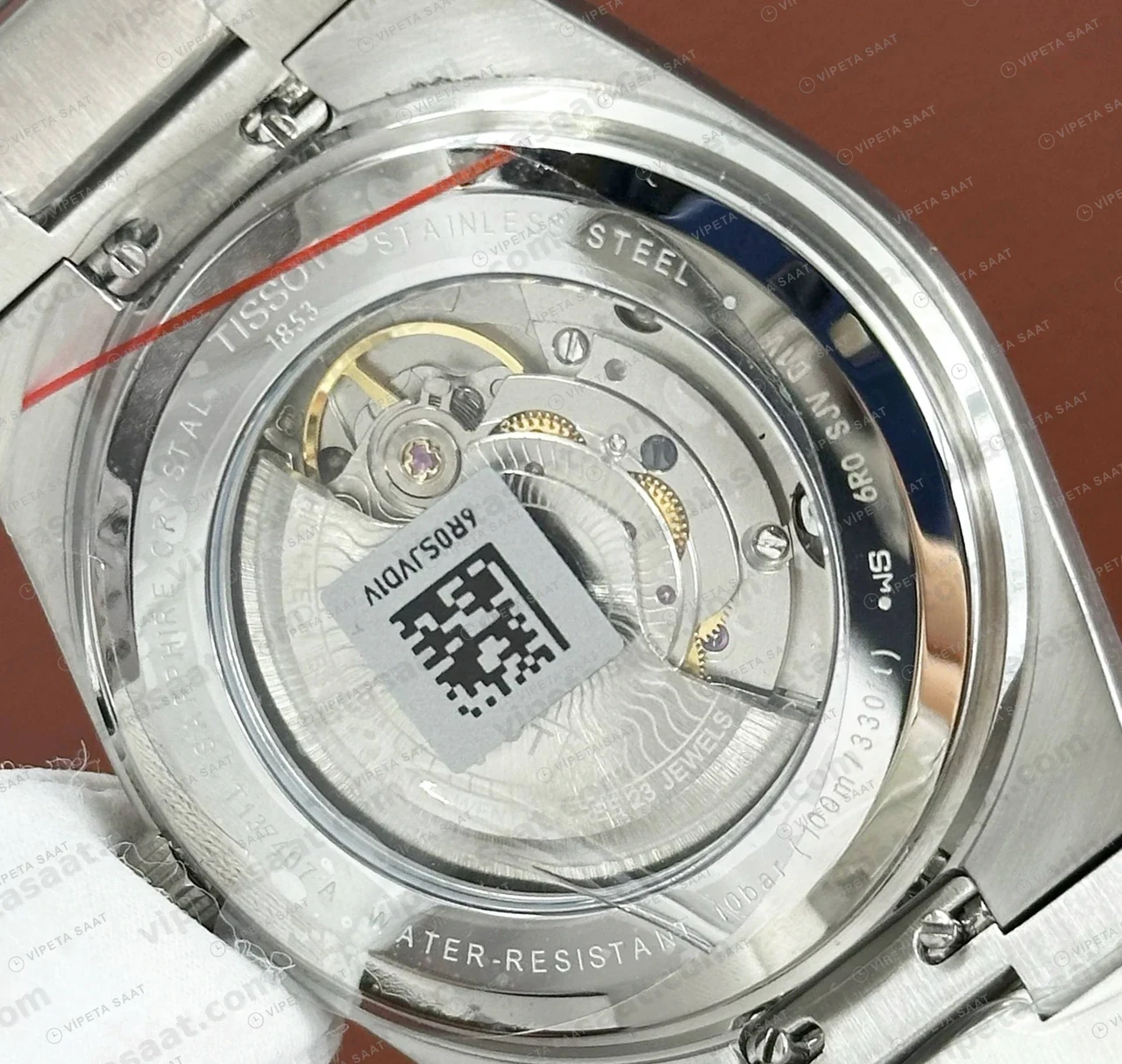 Tissot PRX Beyaz Rose Cift Renk Kadran Eta Saat kordon detayı