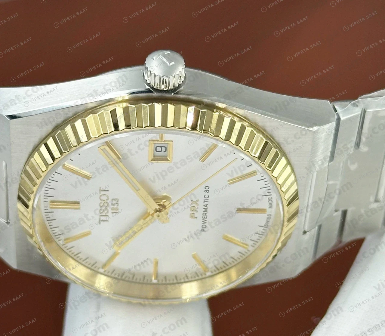 Tissot PRX Gümüş Altın Fluted Bezel Eta Saat kadran detayı