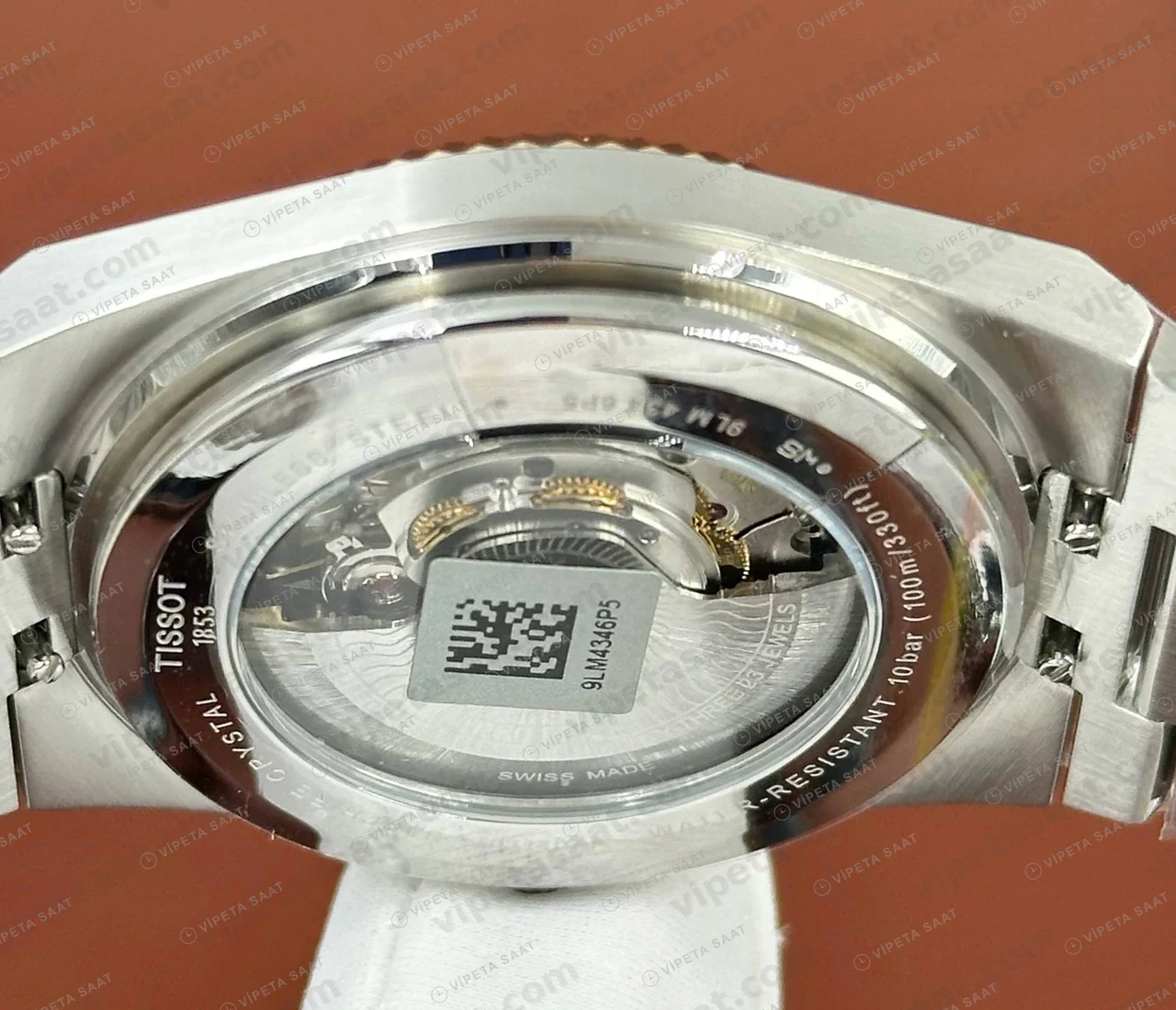 Tissot PRX Gümüş Altın Fluted Bezel Eta Saat yan profil