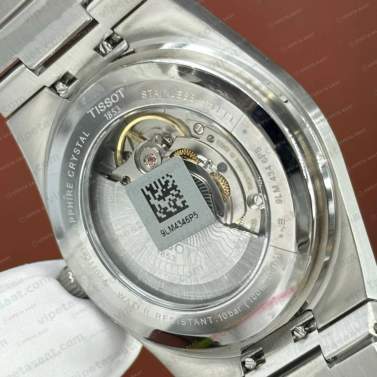 Tissot PRX Gümüş Altın Fluted Bezel Eta Saat kordon detayı