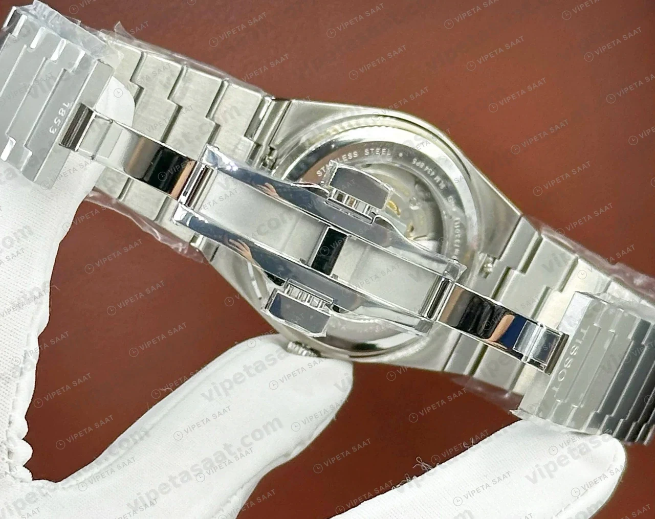 Tissot PRX Gümüş Altın Fluted Bezel Eta Saat profil