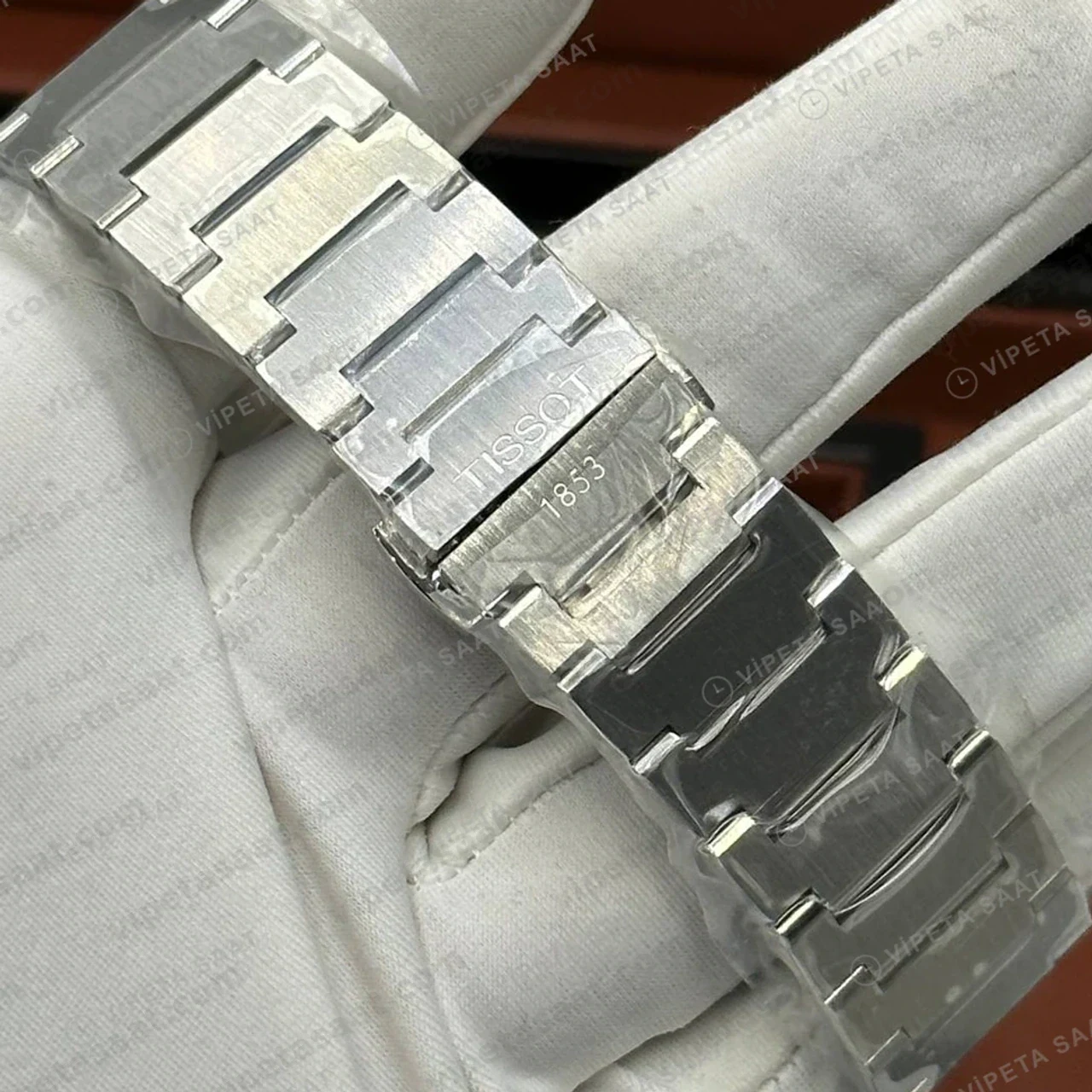Tissot PRX Gümüş Çelik Arka Kapak Duz Eta Saat kordon detayı
